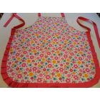 Rózsaszín fodros virágos kötény 